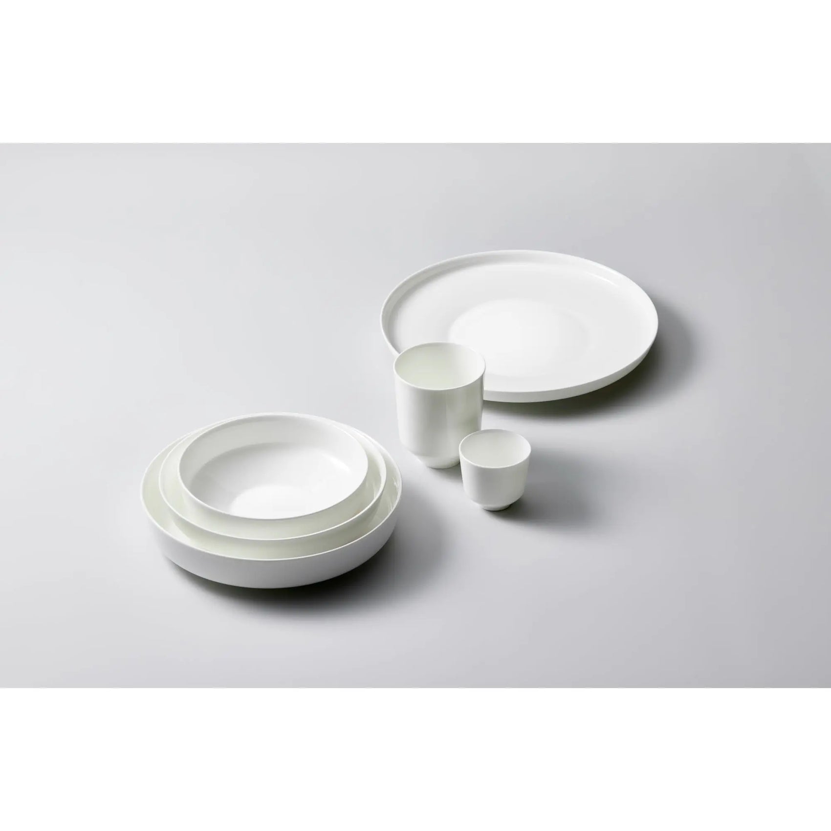 Dibbern Juno Salad Bowl, German fine bone china bowl with smooth white surface and modern silhouette.
